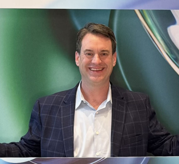 Headshots of four new faculty members